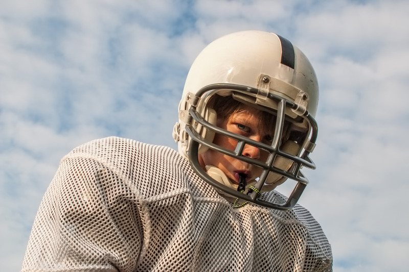 Child wearing a custom mouthguard